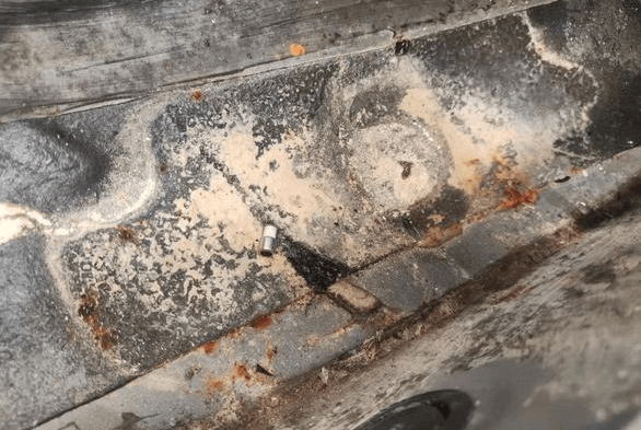 Rust and mud stains left after a car is submerged in water